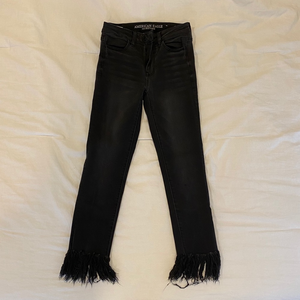 Black cropped fringe jeans